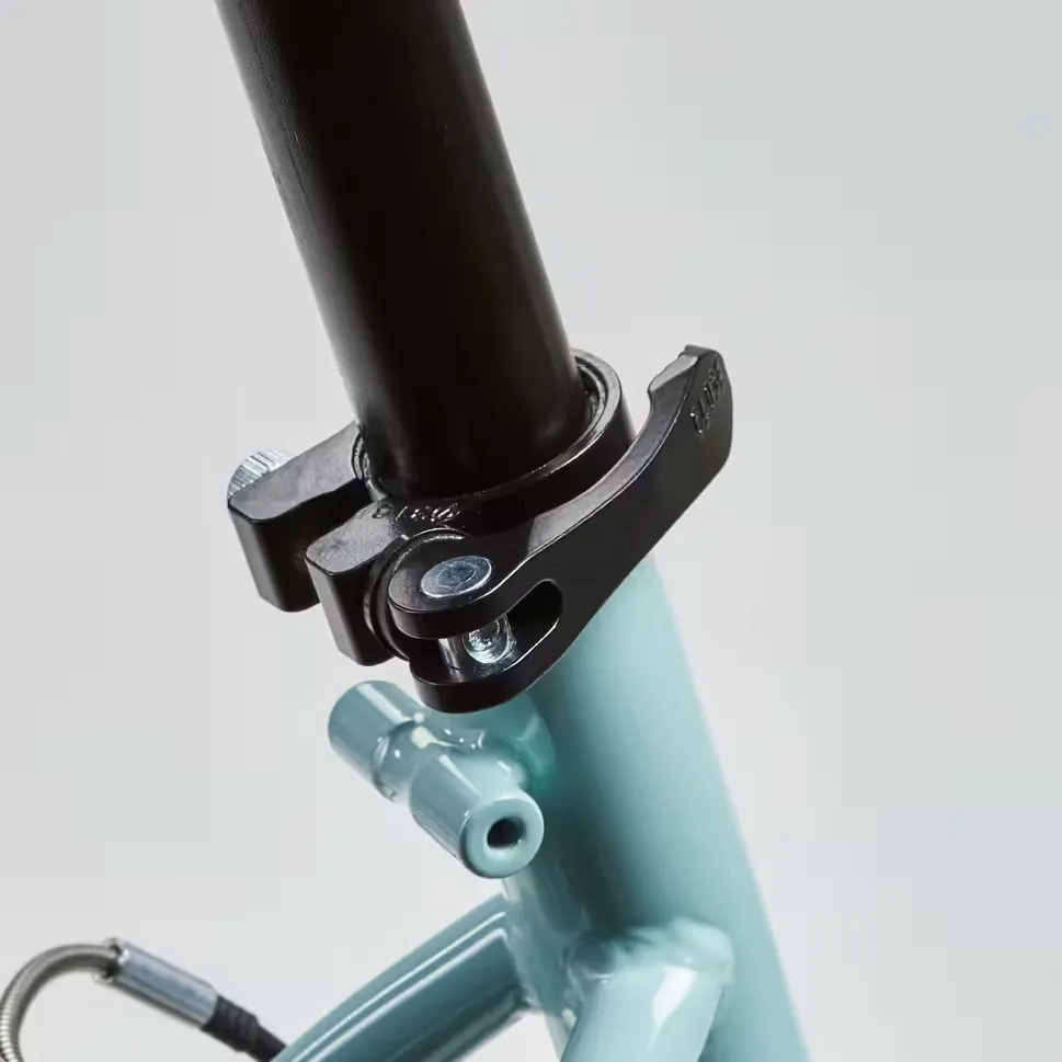 Quick-release seat clamp for setting the saddle height